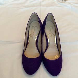 Jewel tone purple heels.